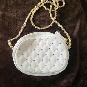 Clutch purse. White with gold accents. White and gold braided strap